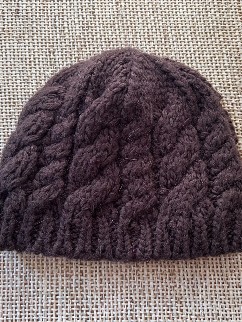 The North Face Kids Brown Cable Knit Beanie with Fleece Lined Inside Rim. OS